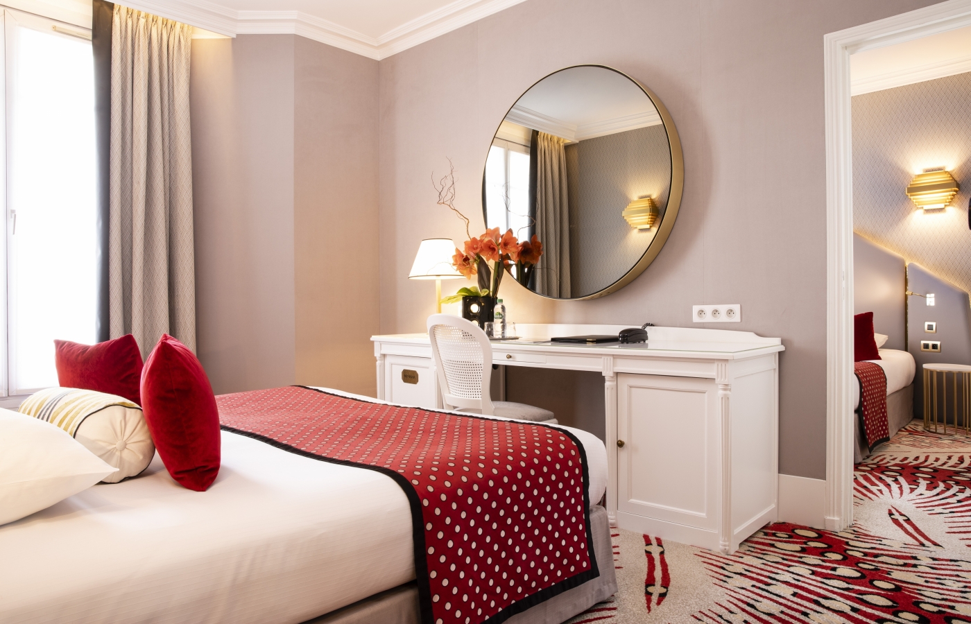 Family Room at the Hôtel Victor Hugo with desk space, high-speed fiber Wi-Fi and Art-Deco decor for leisure travelers.